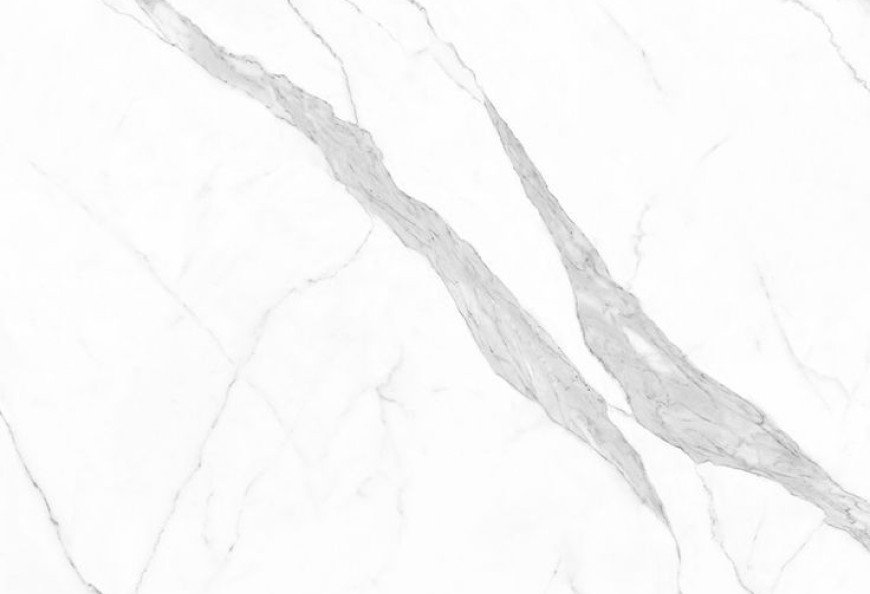 Calacatta Marble - Close-up of a marble surface showing intricate grey veins, typical of certain types of marble countertops.