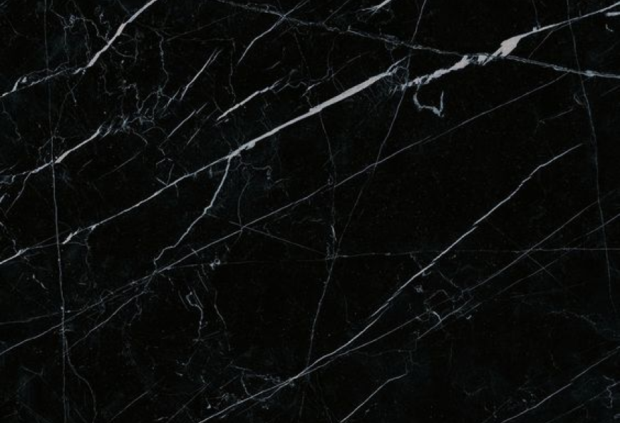 Nero Marquina marble, a dark and elegant stone for types of marble countertops, with white veins.