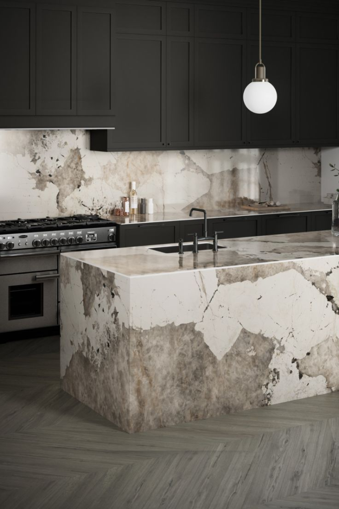 Modern kitchen with unique marble countertop, showcasing types of countertops.