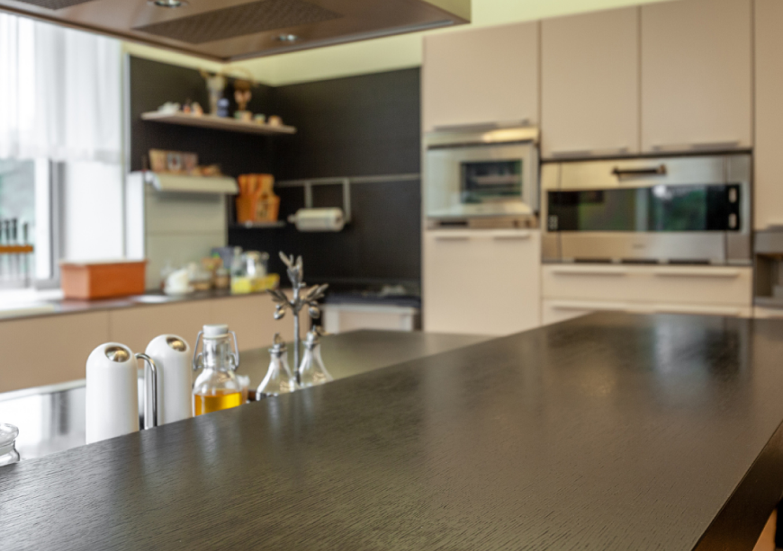 Modern kitchen with sleek countertops and appliances, recently upgraded in a Vancouver kitchen makeover.