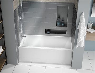 Modern alcove bathtub in a serene bathroom with large plants and natural light, showcasing types of bathtubs.