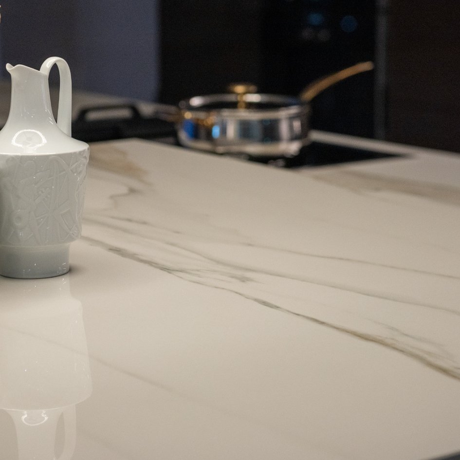 Elegant white Caesarstone Quartz Surface countertop in a modern kitchen.