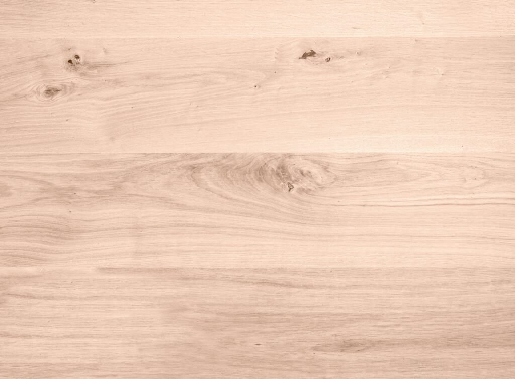 Waterproof plywood flooring with a smooth, natural wood finish, installed in a clean, well-lit space.