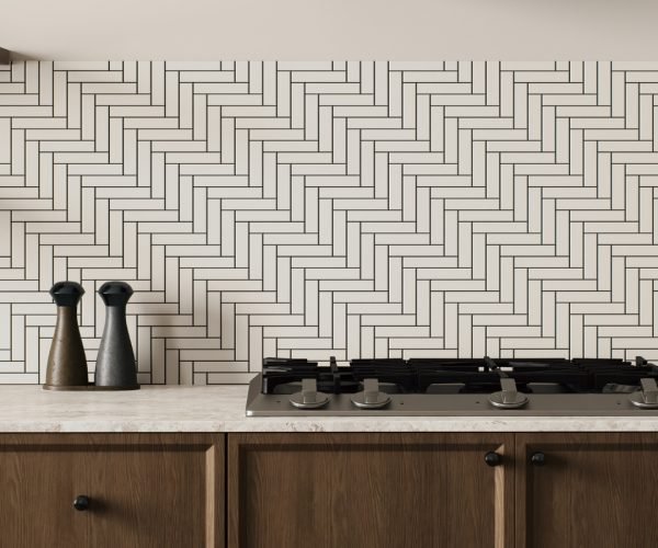 Quartz countertops and backsplash: Modern kitchen with a herringbone tile backsplash, wooden cabinets, and a gas stovetop.